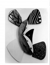 A black and white image of a painted abstract figure.