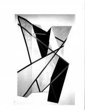 A black and white photograph of a painted construction.