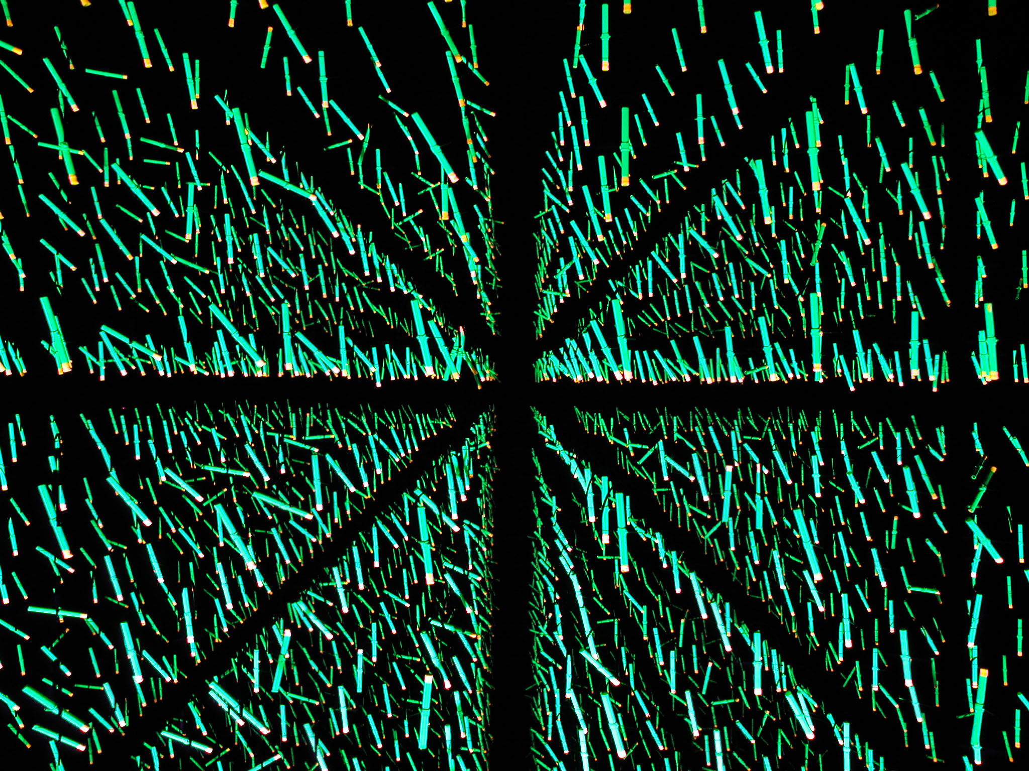 Green fluorescent strips arranged in gridded, triangle-shaped sections.