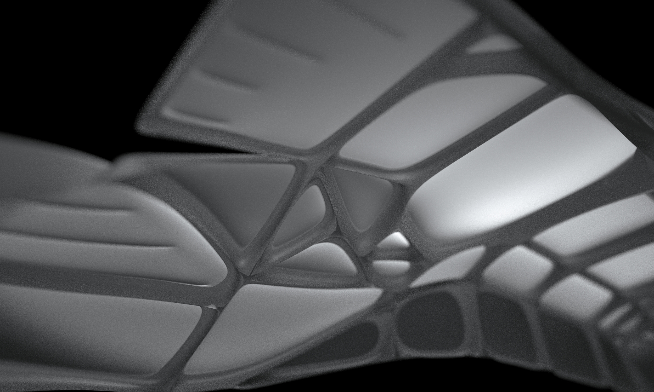 Detail view of a greyscale sculpture made of varying polymer segments.