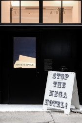 A white sign that reads 