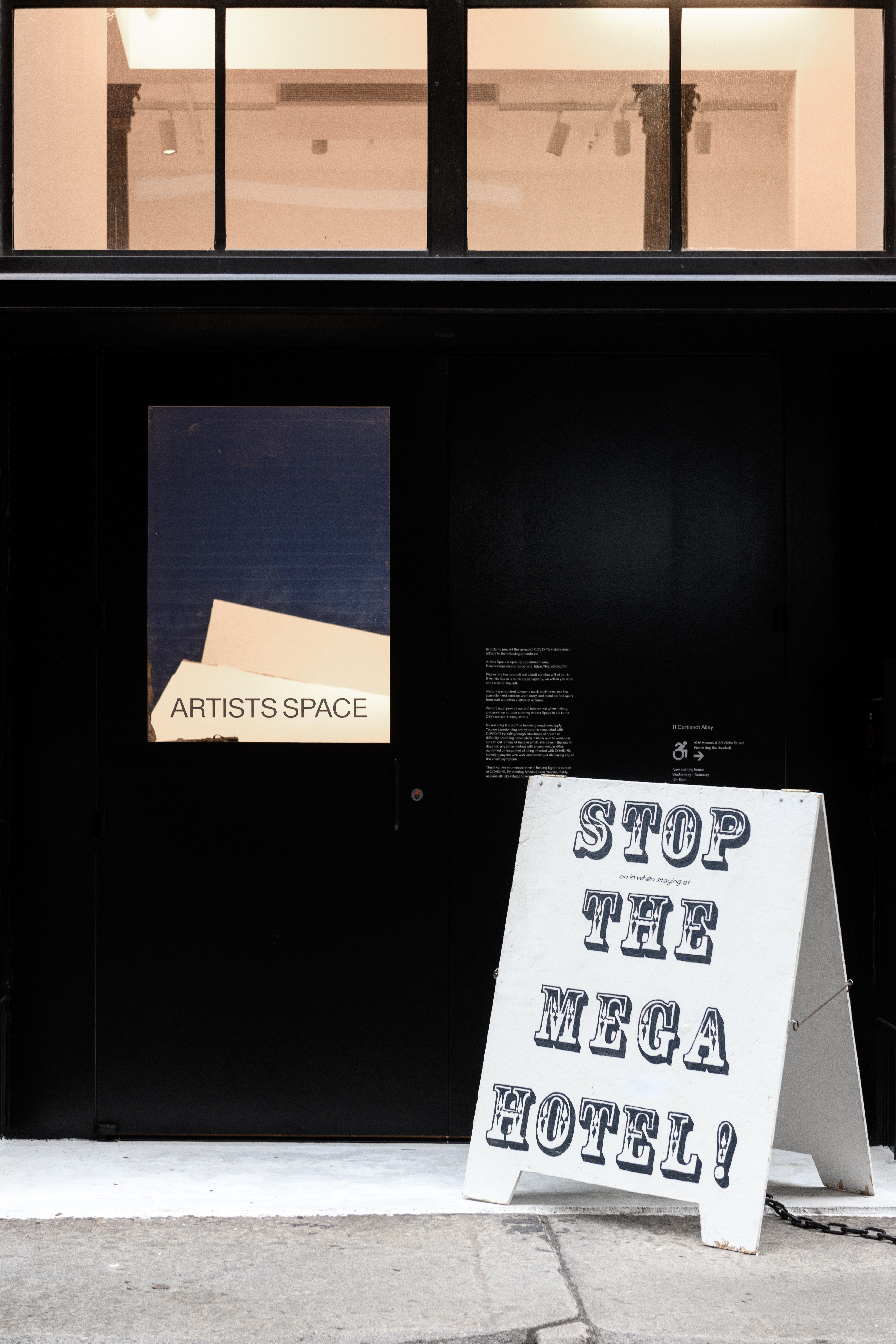 A white sign that reads 