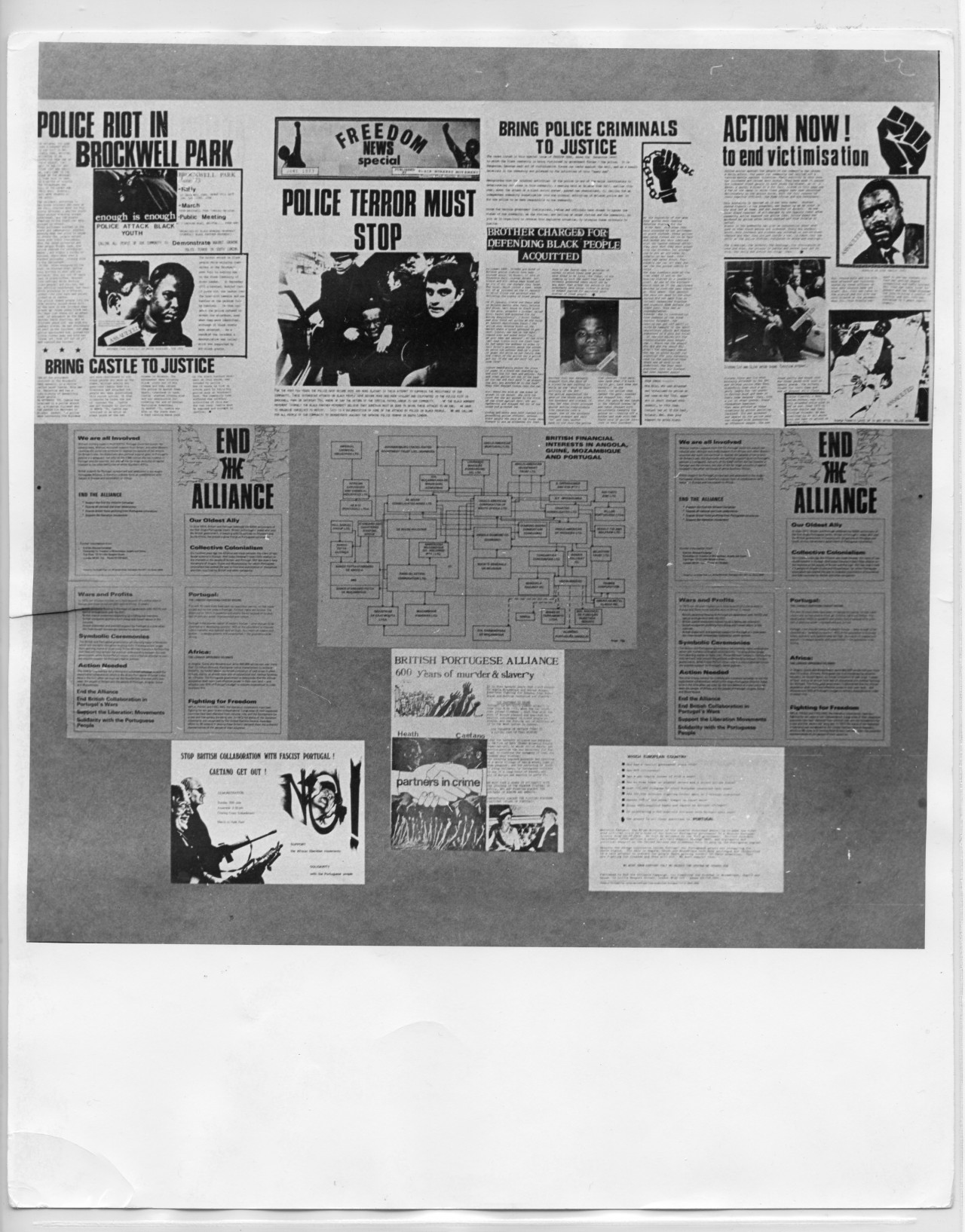 A photograph of a collage with newspaper articles and other paper ephemera.