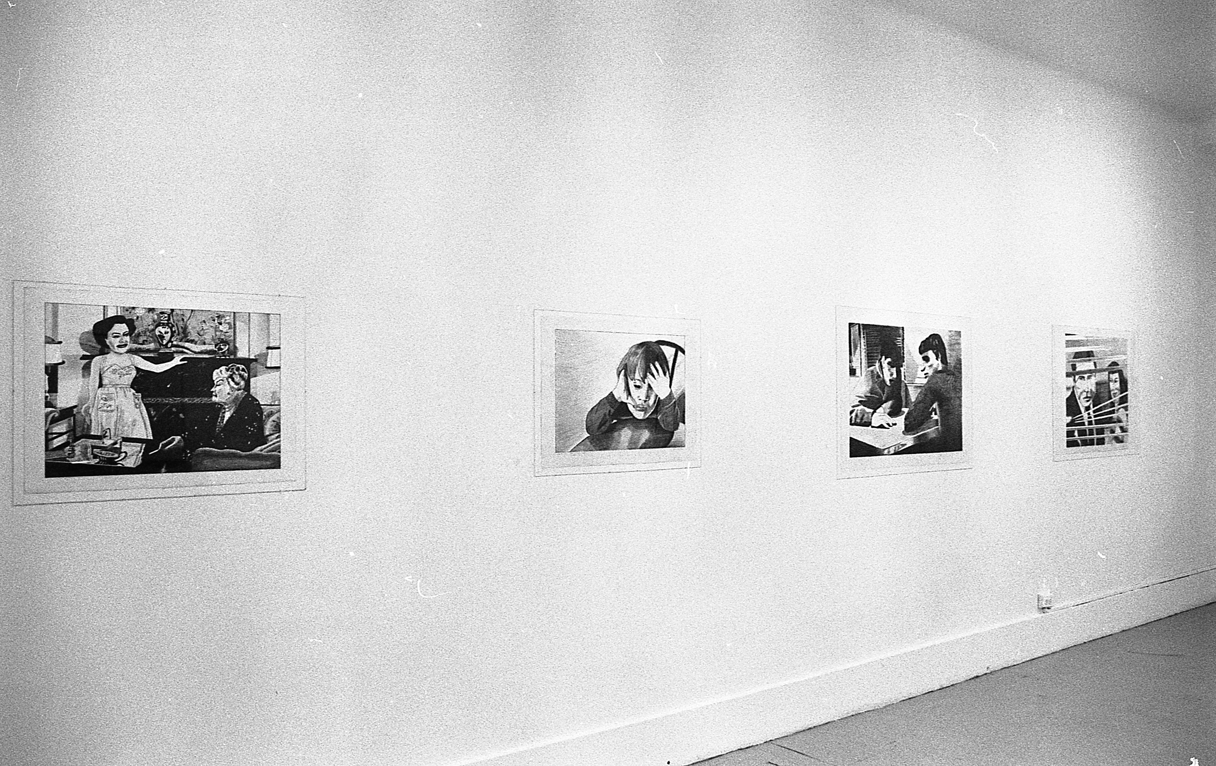 Four drawings are hung in a row on a white wall. The leftmost drawing shows two women sitting in a living room. The next shows a figure holding their head in their hands. The next depicts two men sitting at a table. The drawing on the far right depicts a man and a woman looking out a window through window blinds.
