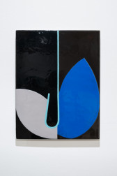 Color image of an abstract work, of black enamel on steel, with a light blue line running down the middle, a light grey petal on one side, and a bright blue petal on the other side.