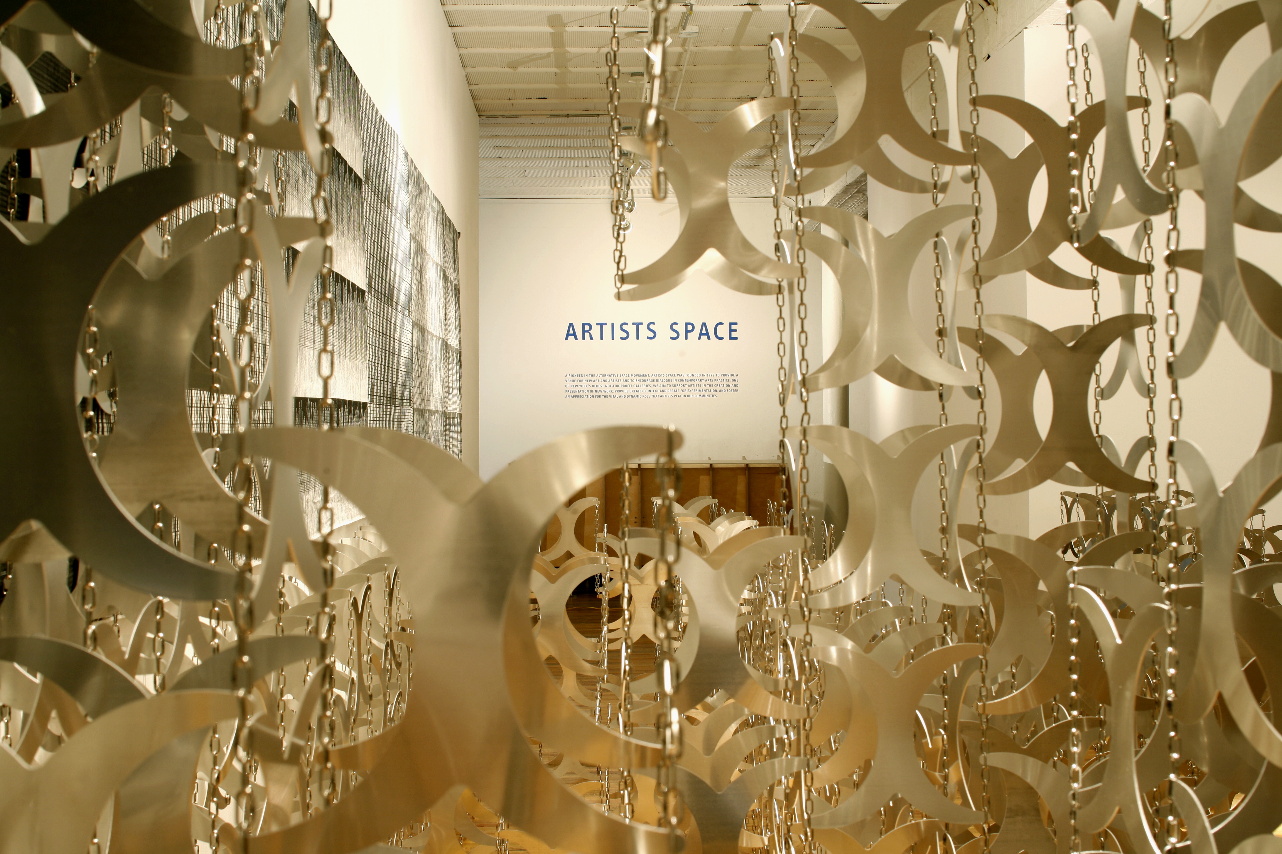 A series of metal cutouts shaped like curved 