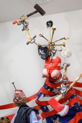 A close-up detail of a large assemblage sculpture.