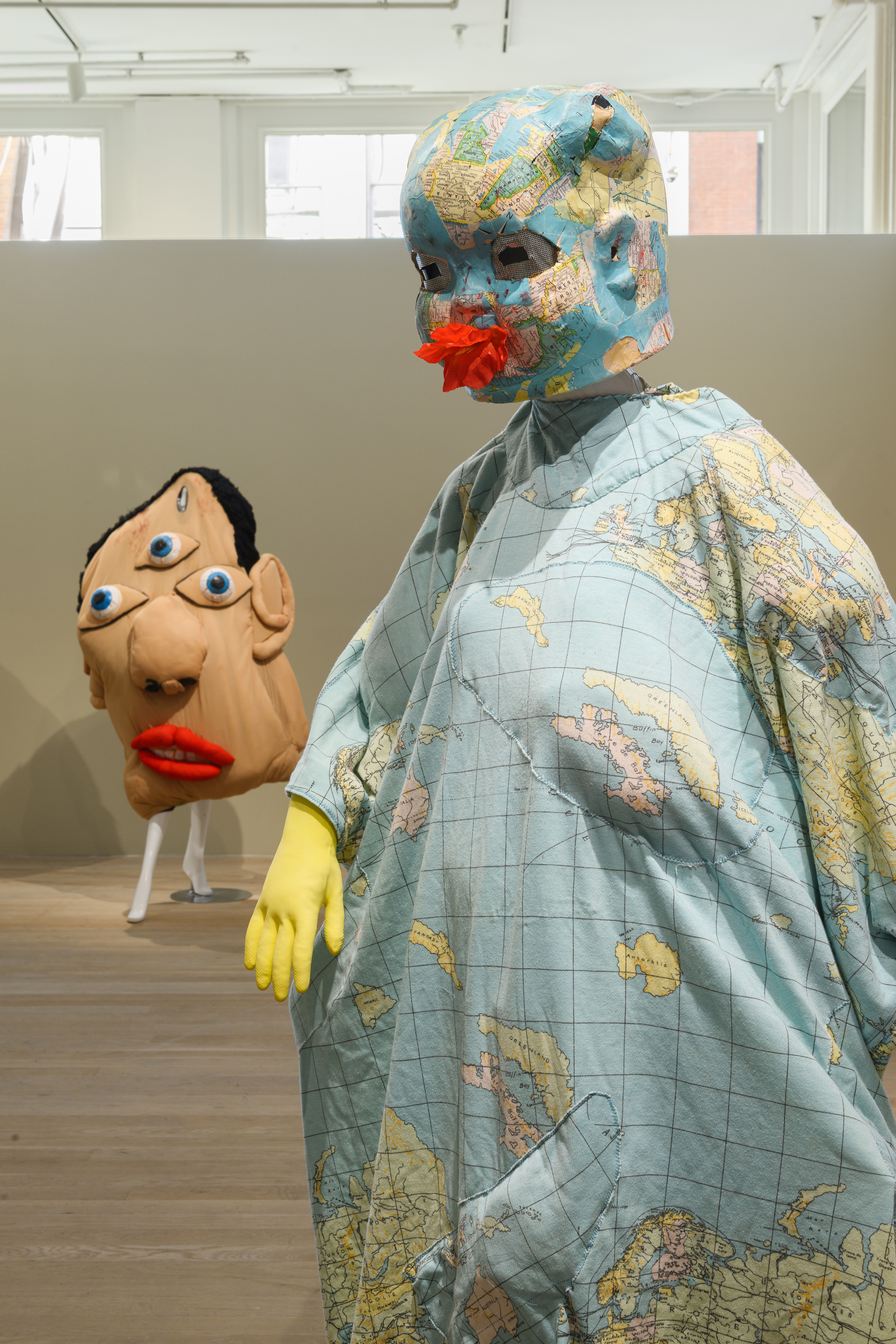 Two life-sized costumes.