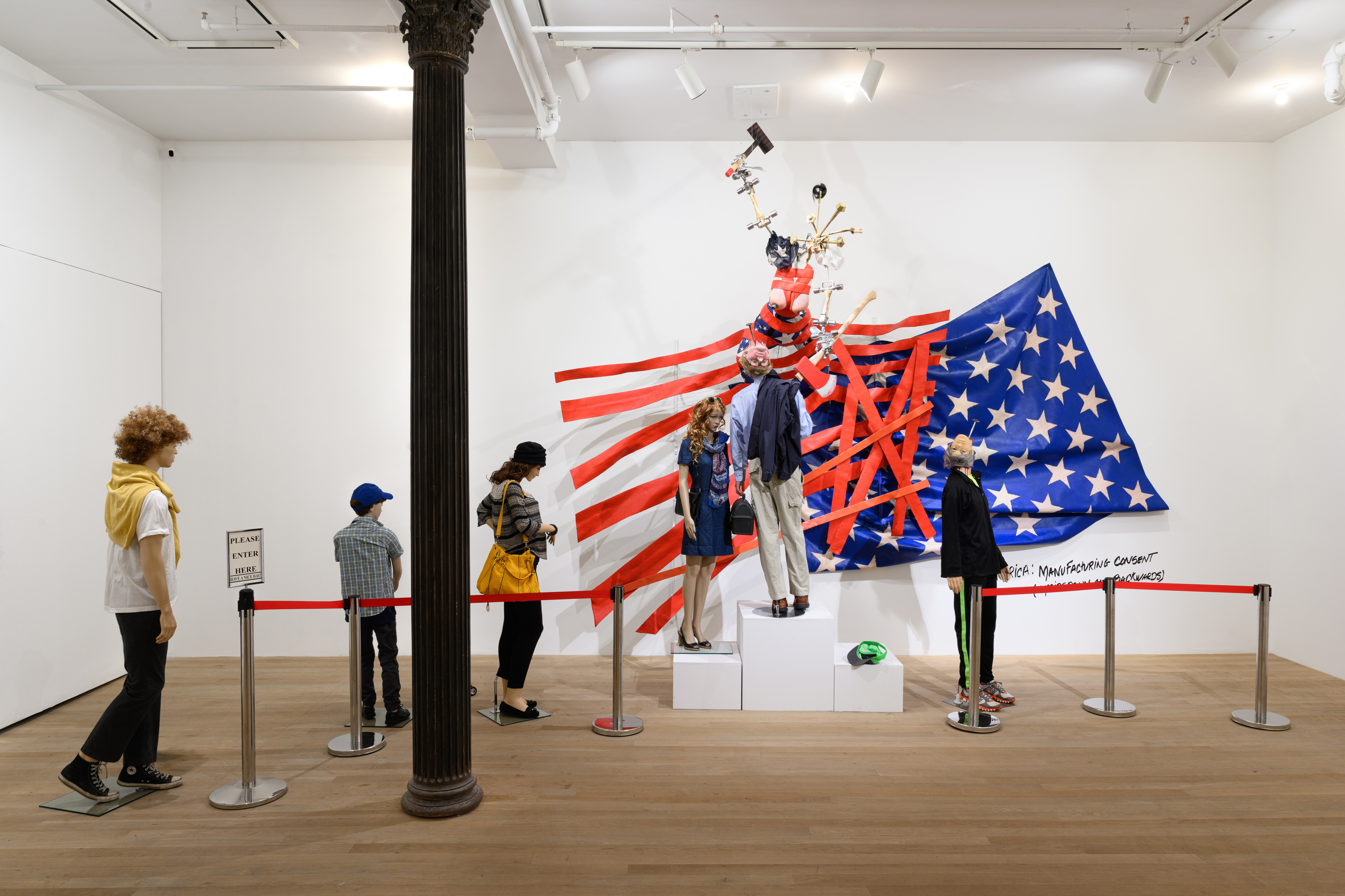 An image of a large assemblage sculpture with various posed and costumed mannequins.