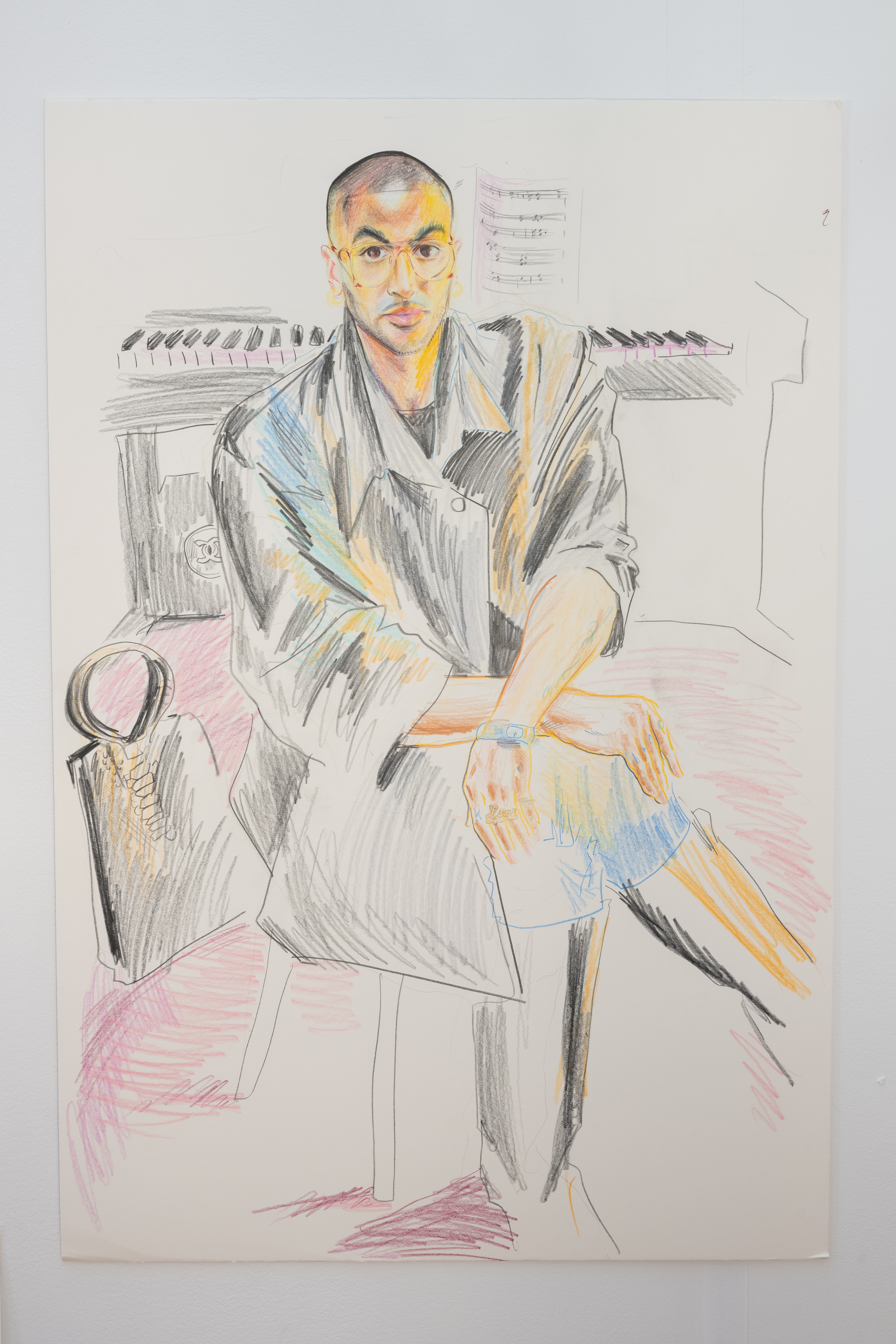 A color image of an unframed colorful drawing. The drawing shows a figure wearing a dark coat, sitting cross-legged on a chair. A purse sits on the floor right behind the chair. In the back, a piano and sheet music.