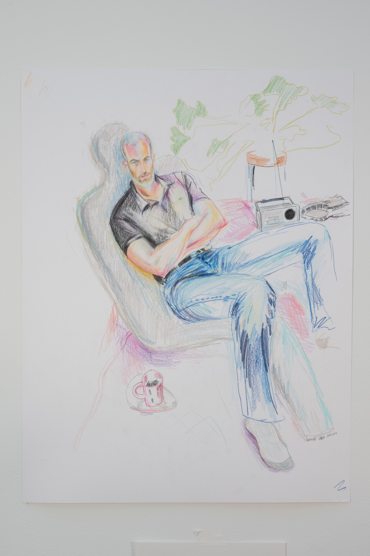 A color image of an unframed colorful drawing of a male-presenting figure. The figure is crossed-arm and sitting back in whats seems like a sofa. A cup of coffee sits on his right, and a potted plant and a vintage-looking radio are on his left.