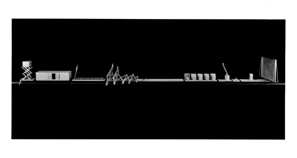 A black and white photograph of a linear model consisting of many elements.