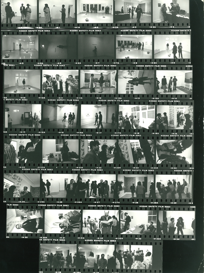 Contact sheet of installation images taken during exhibition opening.