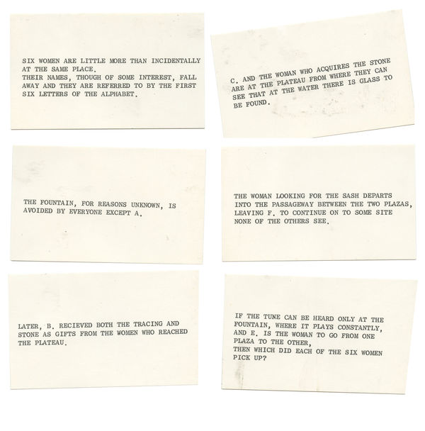 A photograph of six index cards with typed up clues.