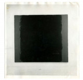 A black and white photograph of a black square painting with a lighter border on the left and right sides.