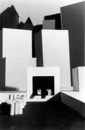 An arrangement of rectangular prisms made of cardboard.