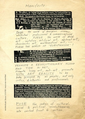A book page; at the top is handwritten text, 