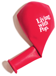 A red deflated balloon, folded at the neck, with white text that reads, 