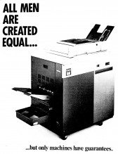 An image with a white background of a large printing machine with black text that reads 