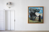 A framed painting is hung on a white wall adjacent to an elevator with a decorative sconce installed above the painted white doors. The painting depicts a chained elephant being trained by a woman in a black dress. The woman holds a baton against the elephant's raised foreleg.