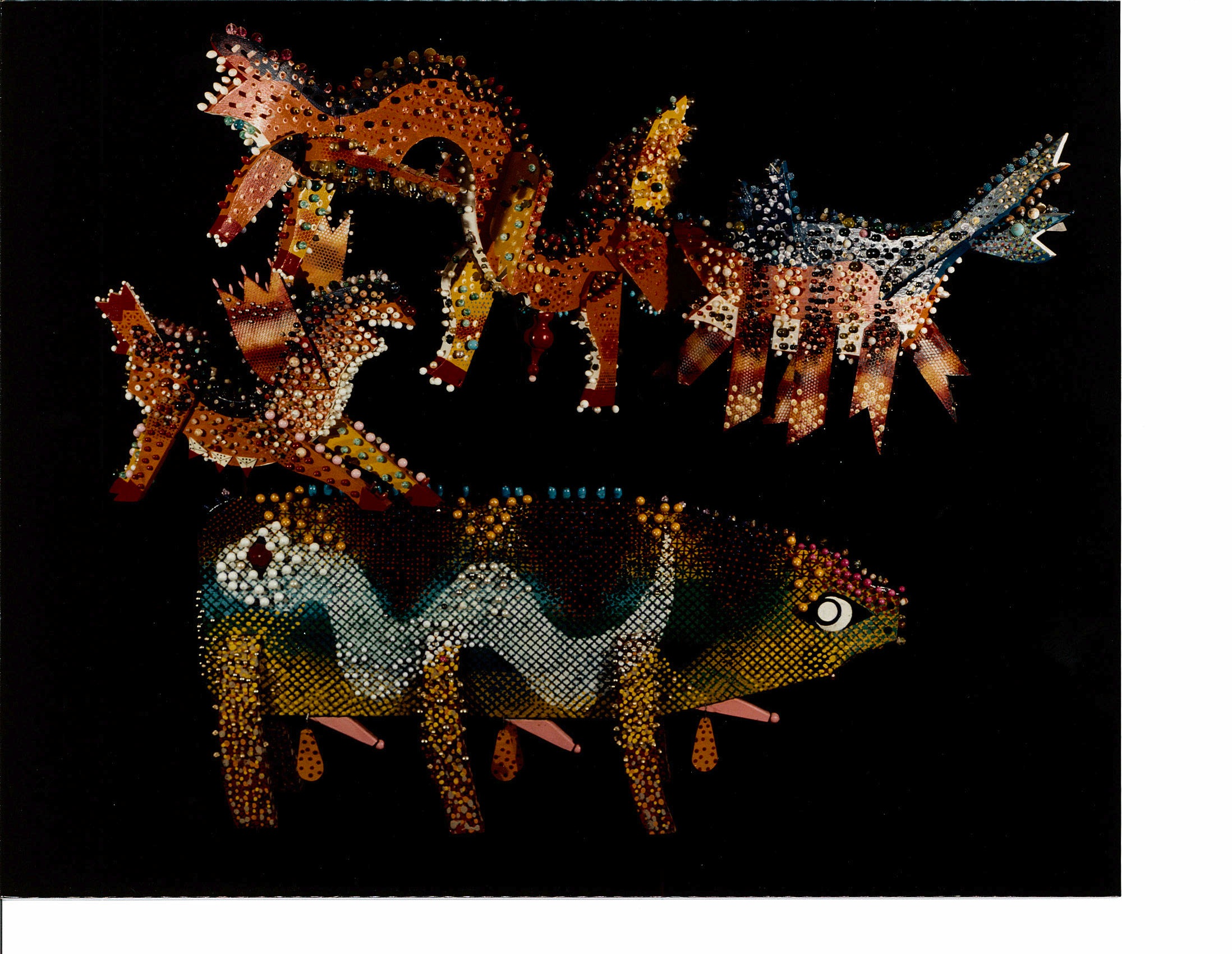 Colorful animal figures appear in space with a black background.