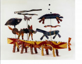 A number of colorful animal-like figures appear in space with a white background.