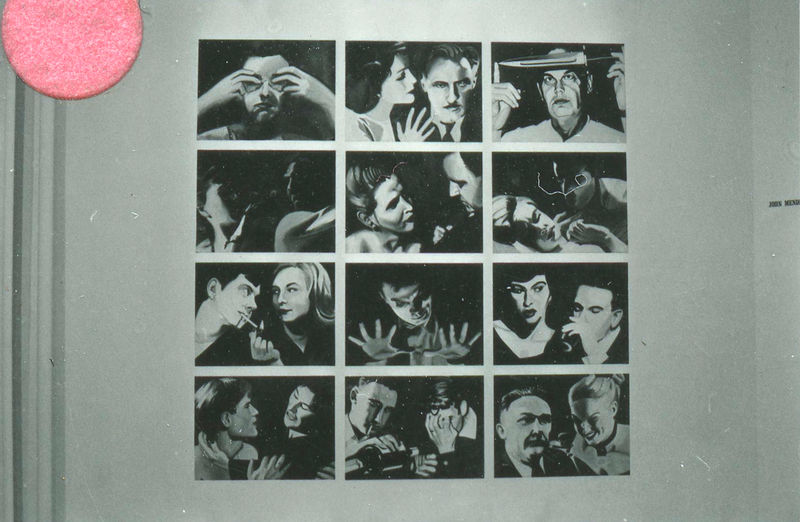 A black and white photograph of a wall featuring twelve black and white photographs, arranged in a grid. The images on the wall are of various human figures.