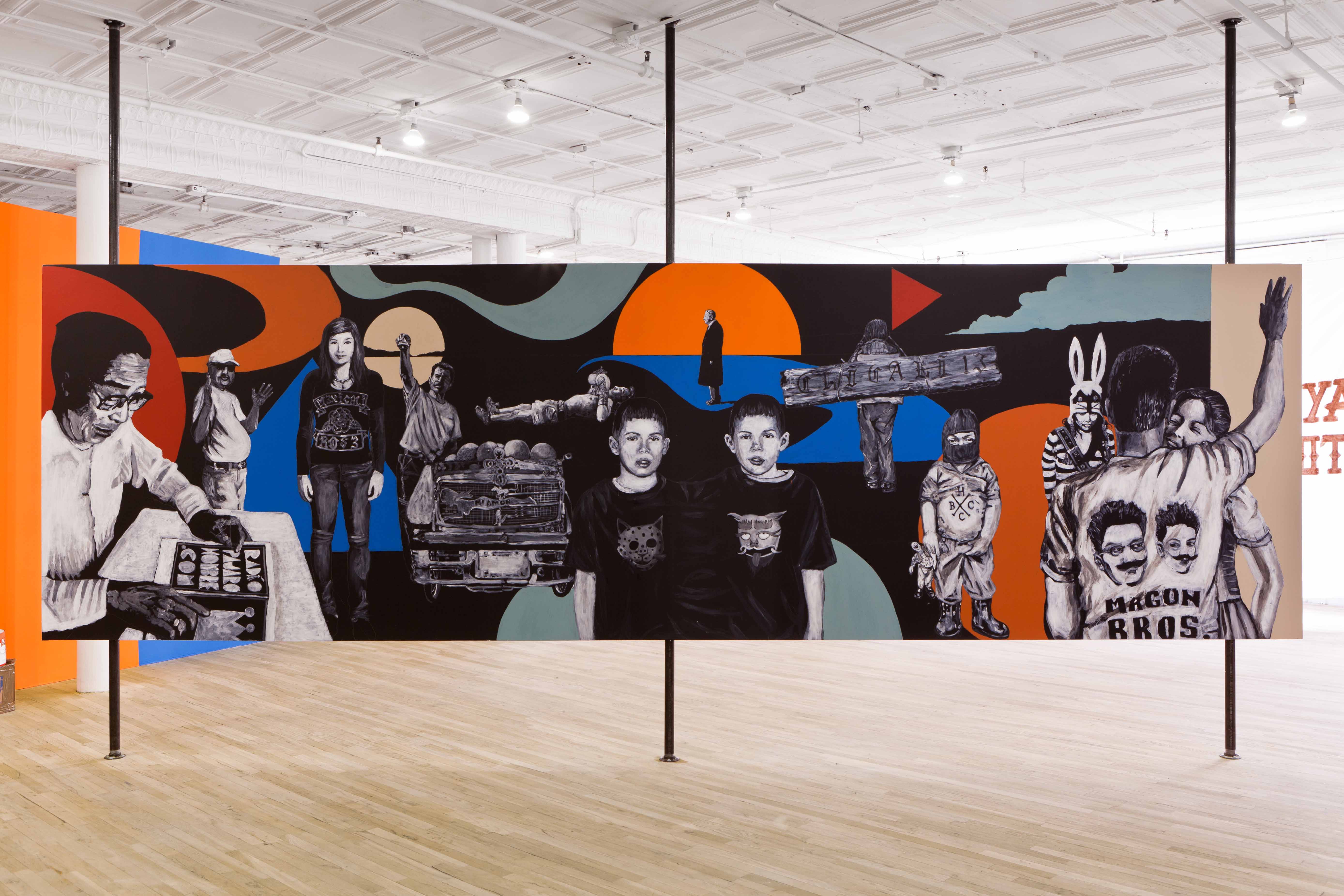 A large, rectangular wall is suspended at the center of three vertical poles in a bright room. The wall is covered in abstract, smooth and multicolored shapes. Amongst the shapes there are several figures of different ages and dress performing different tasks. One raises his fist in the air. Two identical looking boys stare at the viewer. Another figure wears a hat with rabbit ears.