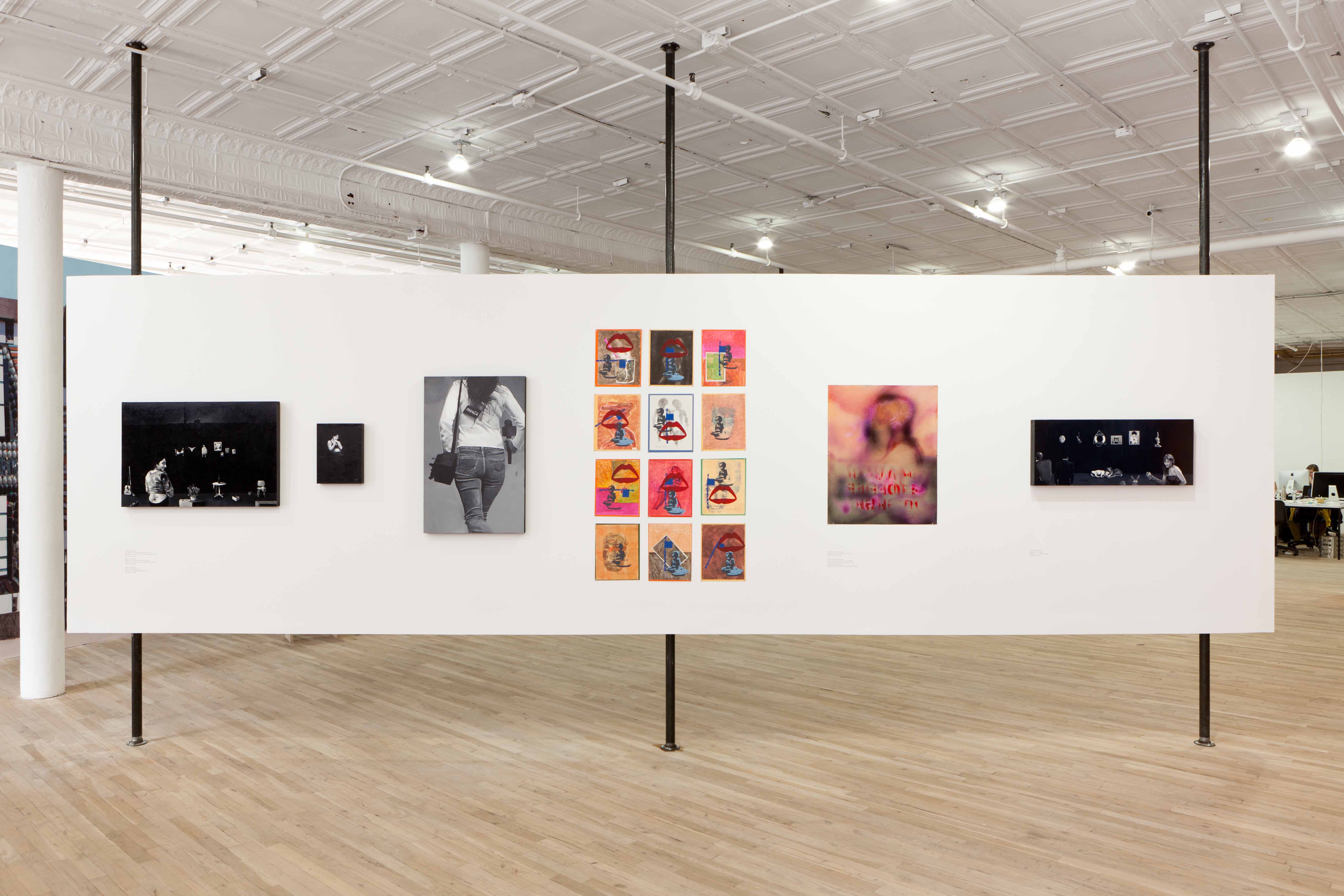 Six artworks are mounted to a white gallery wall. On the far left and right are three black and white compositions, followed by a photograph of the back of a walking figure. At the center are two colorful, abstract compositions on paper.