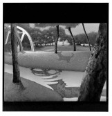 A black and white photograph of a painting of a pastoral landscape with trees and a waterway.