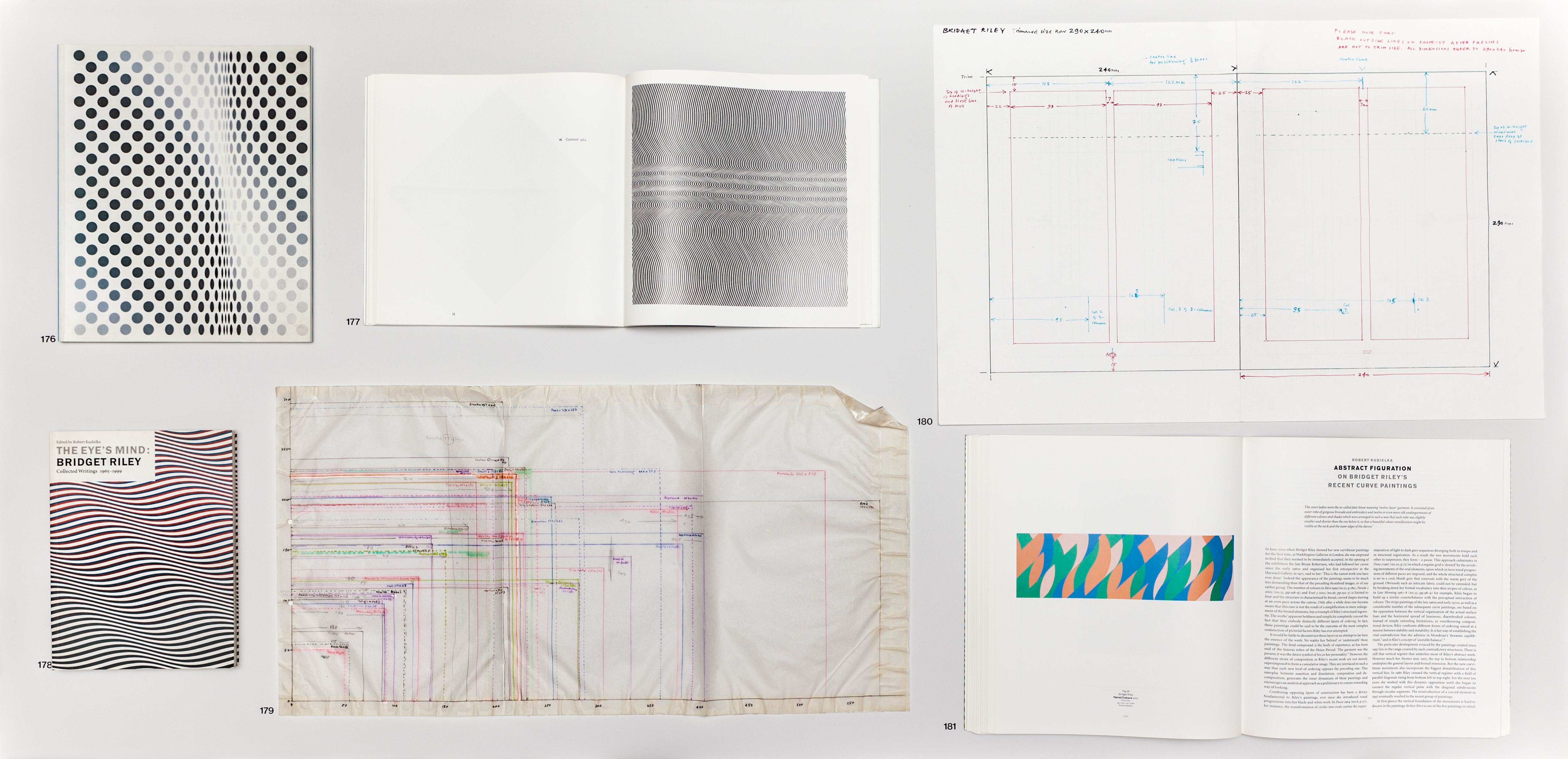 A grid of 6 documents sitting opened on a table.