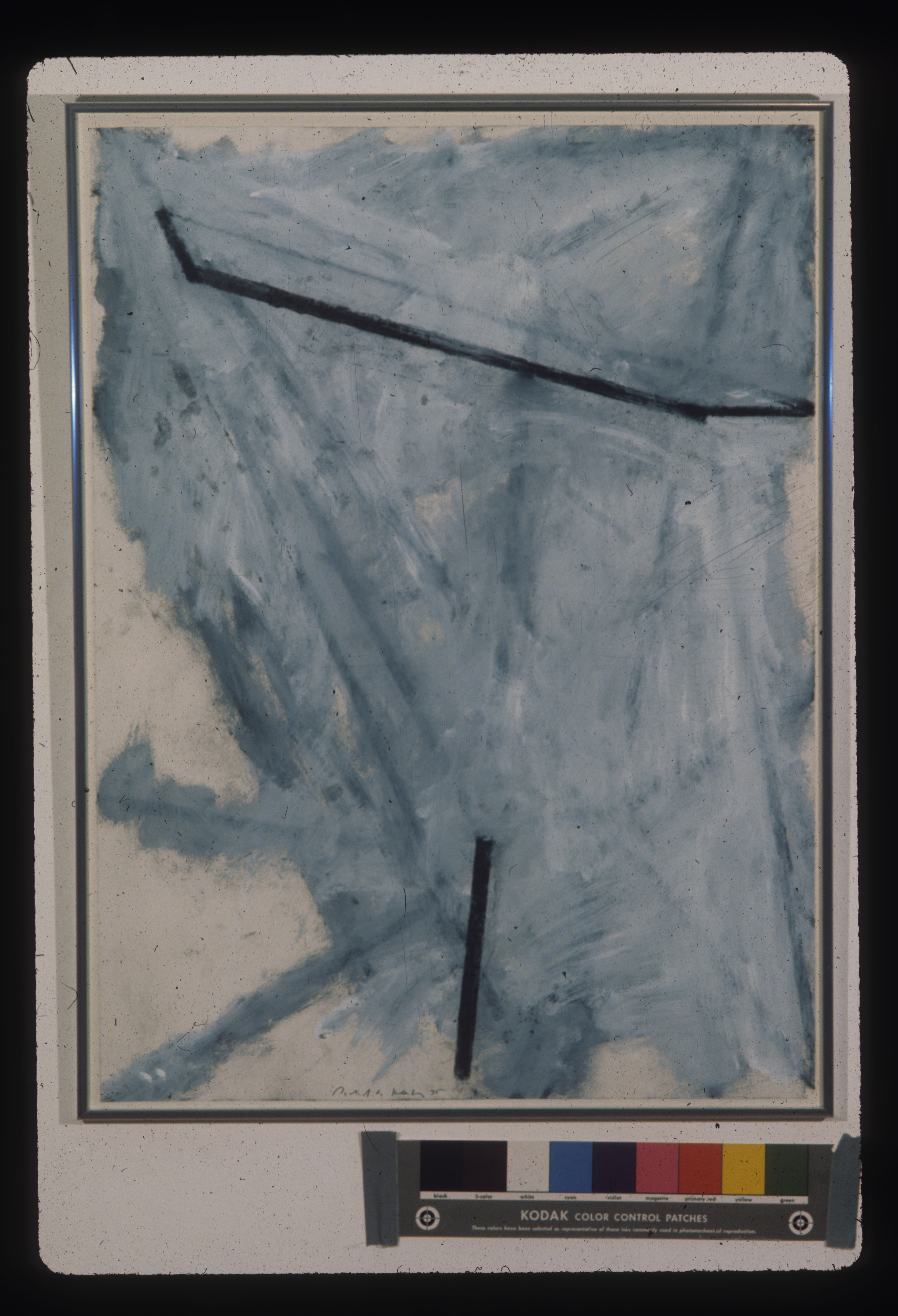 A color installation photograph of a black, grey, and white abstract painting on a white wall.