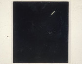 A color installation photograph of a black and white abstract painting on a white wall.