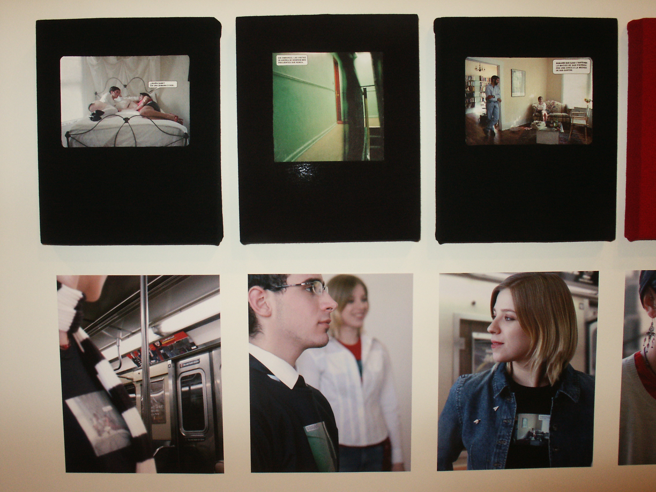 Photographs hung on a wall in two rows. The top row photographs are outlined in black and show images of people inside an apartment. The bottom row photographs show people on a subway.