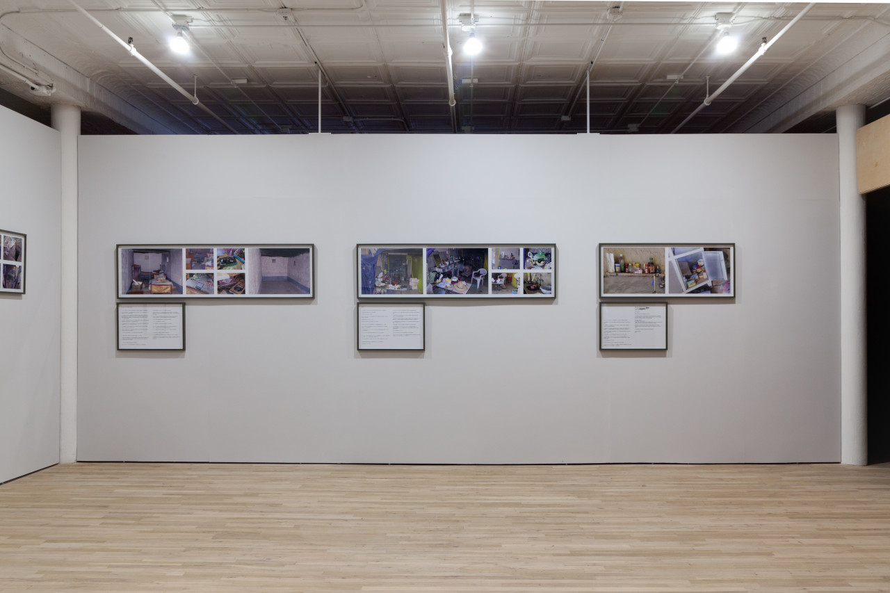 A white wall with three sets of multiple photographs of rooms. Each set of photographs has a framed accompanying text below.