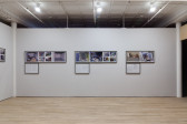 A white wall with three sets of multiple photographs of rooms. Each set of photographs has a framed accompanying text below.