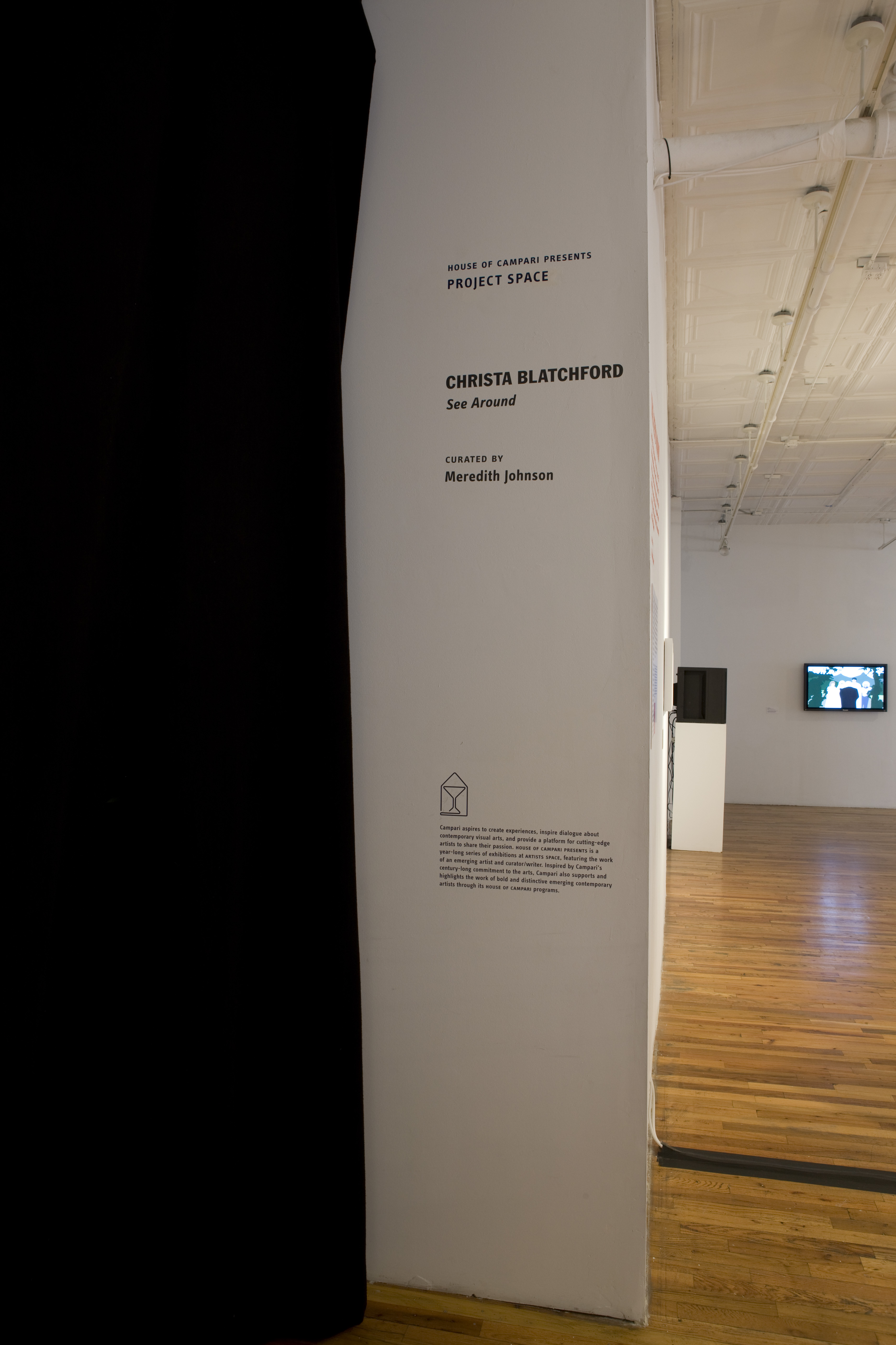 A corner of a wall imposed with the text, 