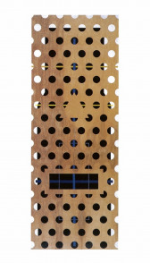 A plywood board with rows of circular holes cut out of it overlays a black rectangle with blue and yellow lines on it.