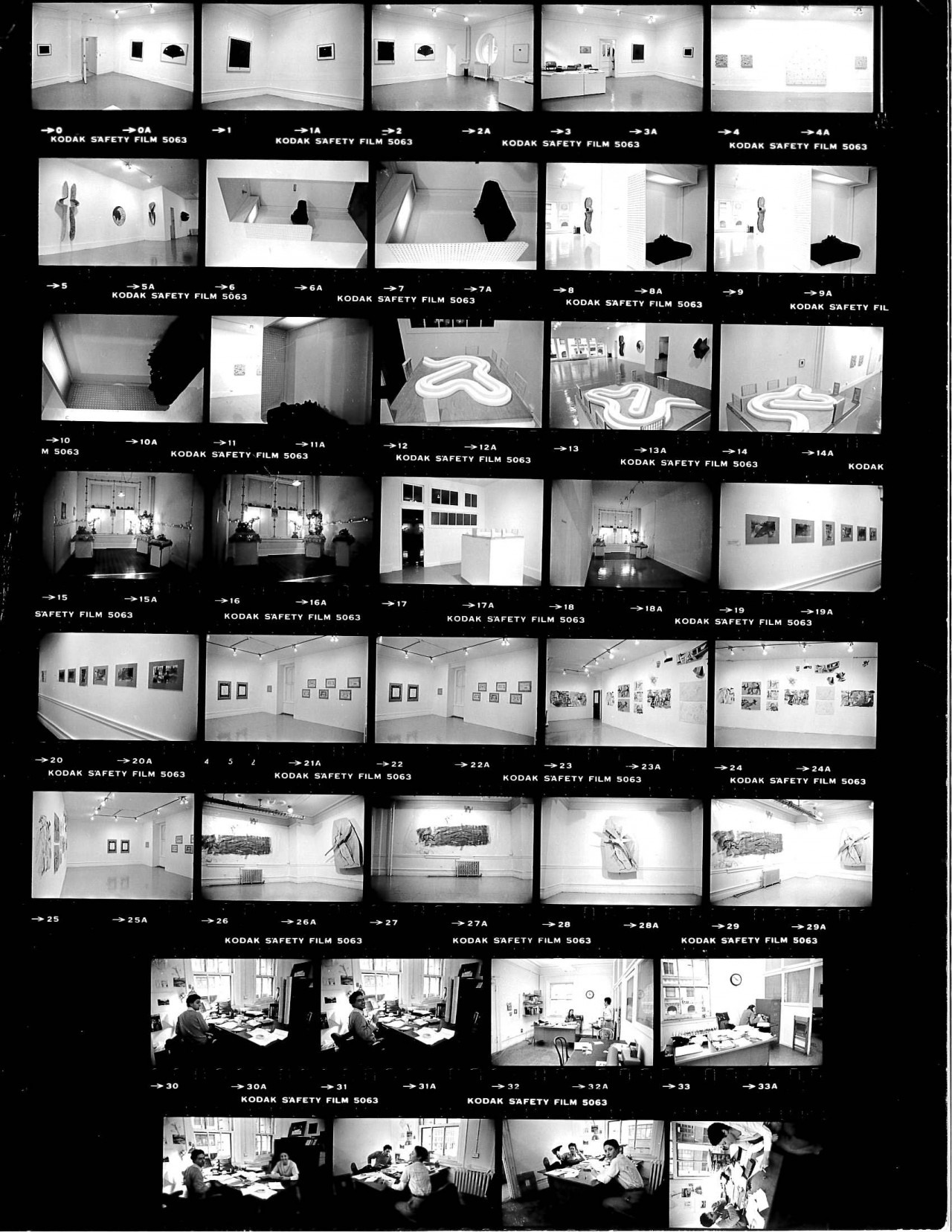 Contact sheet of stills depicting numerous installation views.