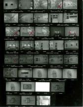 Contact sheet of stills depicting numerous installation views.