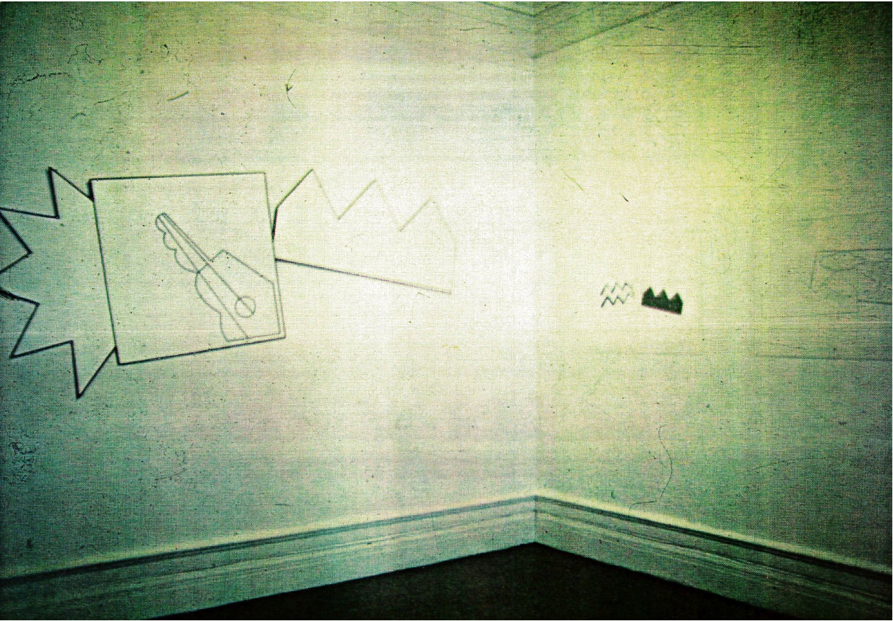 Grainy photograph of a wall drawing in a gallery space.