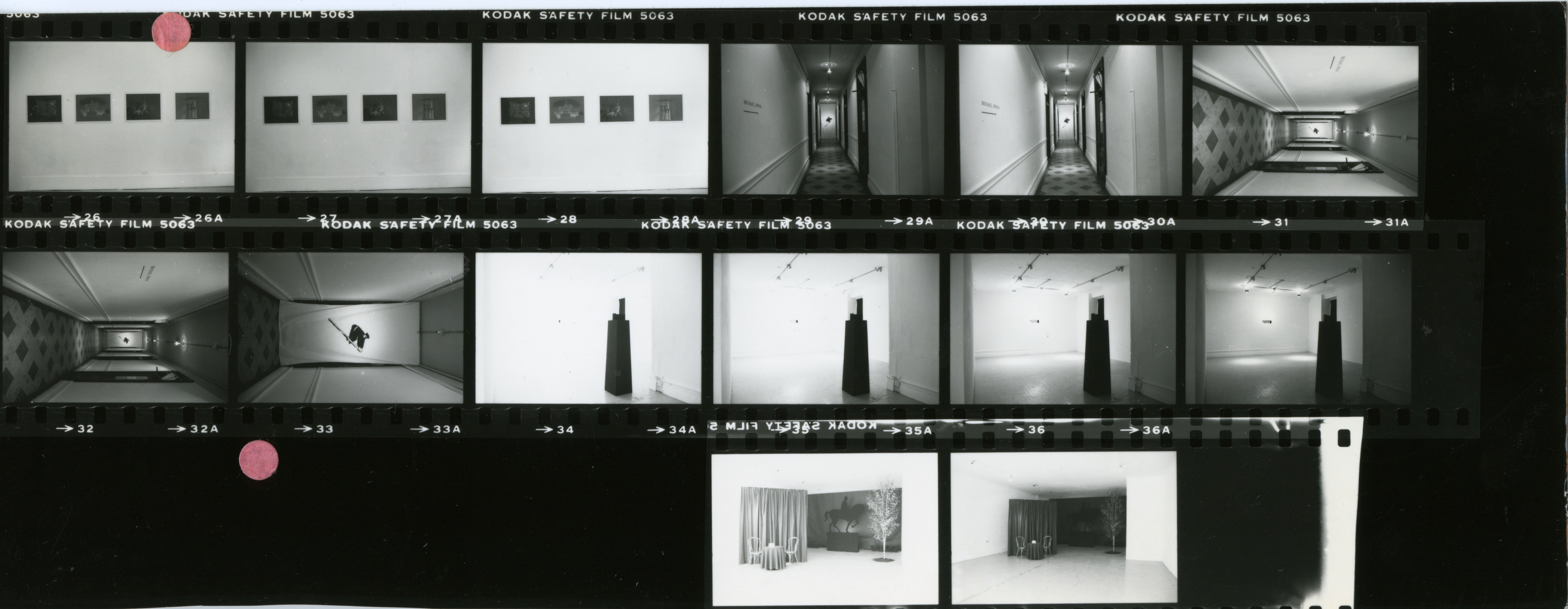 Contact sheet of stills depicting numerous installation views.