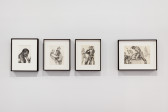 Four pornographic illustrations framed on a wall.