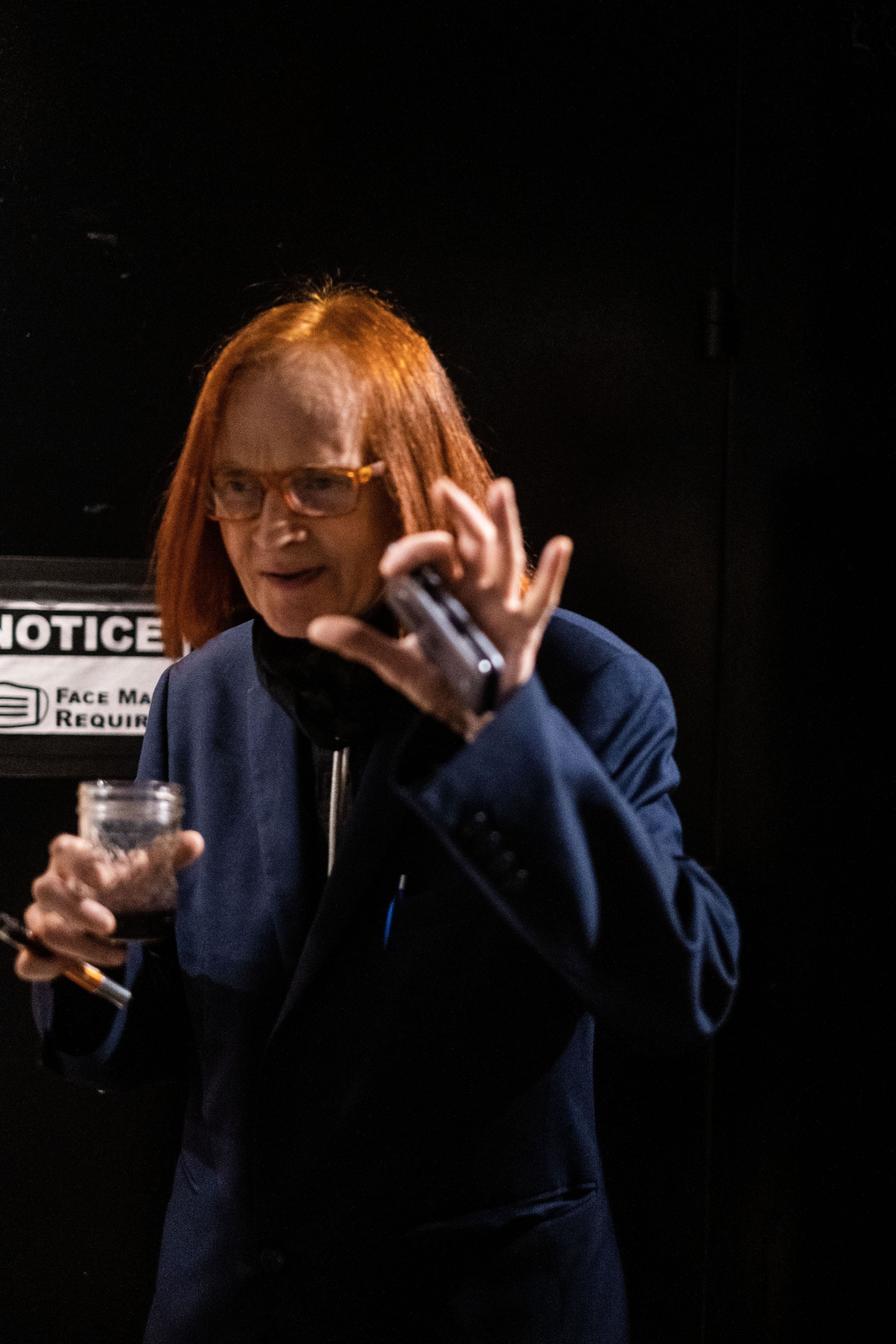 Portrait of a figure caught offguard.