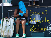 A tennis player sits next to a white bag with gold detailing and white tennis racket. A blue towel covers their face. On the right, 