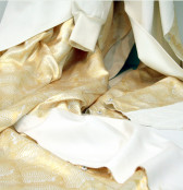 Draped fabric that reads 