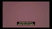 In front of a pixelated red background, a yellow caption appears on top of a black bar that reads: “But whatever debt we’re in, whatever risks, we’re in together.