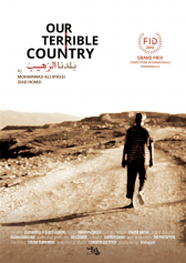 A movie poster depicting the title and pertinent information of the film, showing a man walking away from the camera down a dirt road in the desert, shot in sepia.