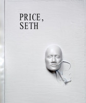 Book cover design featuring a white mask in the shape of a human face installed on a white backdrop. Ribbons of white material extend from the mask's lower right side, curling on the backdrop. Black text reading 