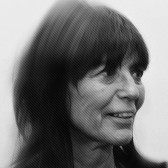 Black and white photograph of Jean Fisher looking to the right.